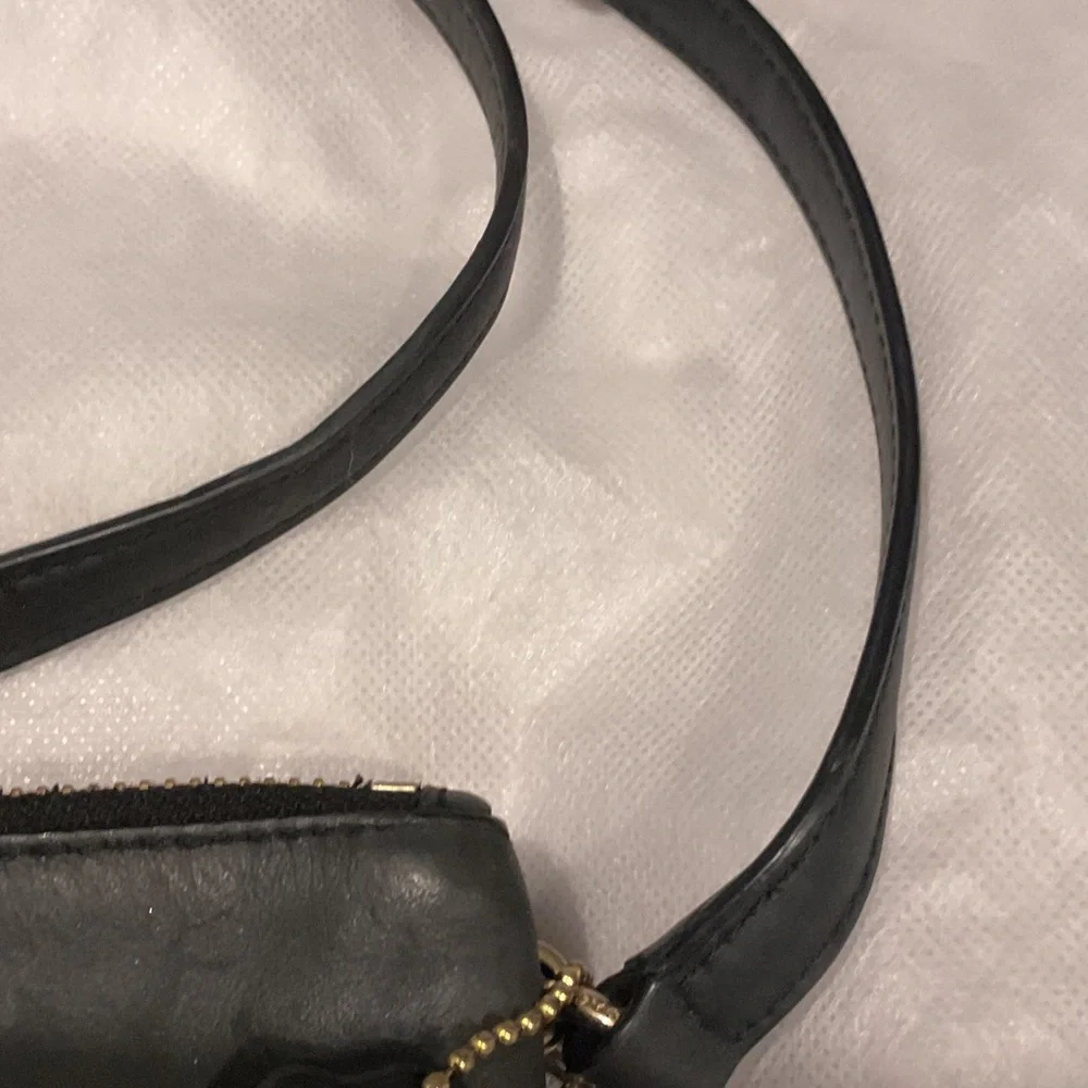 Coach Black Leather Crossbody Bag with Gold Accents